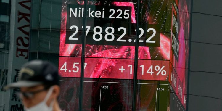 Asia shares rise on US rally ahead of expected Fed rate hike