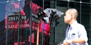 Asian shares rise on the back of Wall Street rally