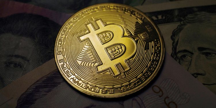 Bitcoin slips to $18,500
