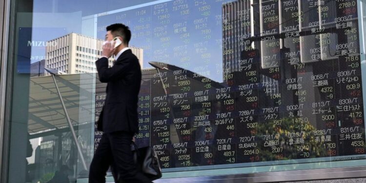 Asian stocks mixed after Wall Street falls on rate hike worries