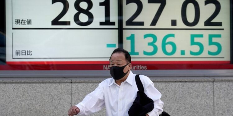 Asian benchmarks mixed as markets eye COVID, inflation risks