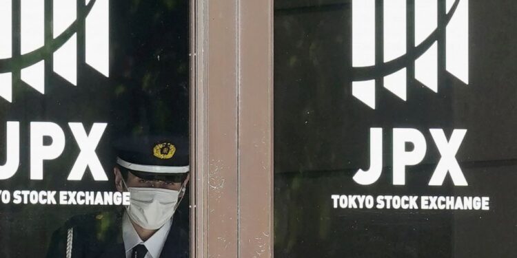 Asian benchmarks mixed as markets await Fed rate moves