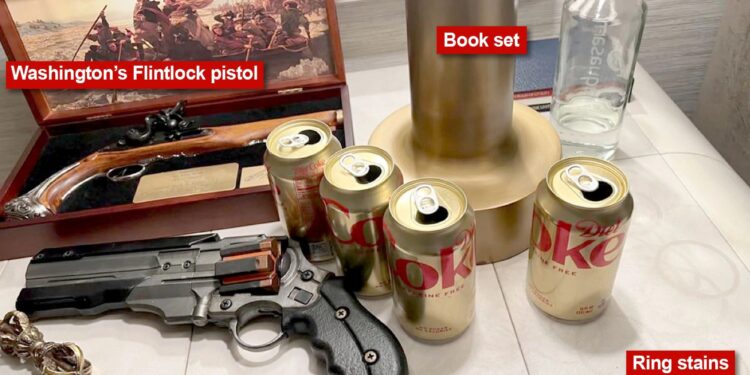 Elon Musk posted a bizarre photo of his ‘bedside table,’ featuring 2 guns, 4 caffeine-free-Coke cans, and a picture of George Washington