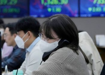 Stocks waver on Wall Street, still on track for weekly gains