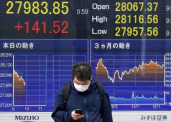 Asian shares are mostly higher ahead of the Fed rate hike decision