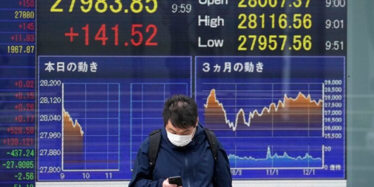 Asian shares are mostly higher ahead of the Fed rate hike decision