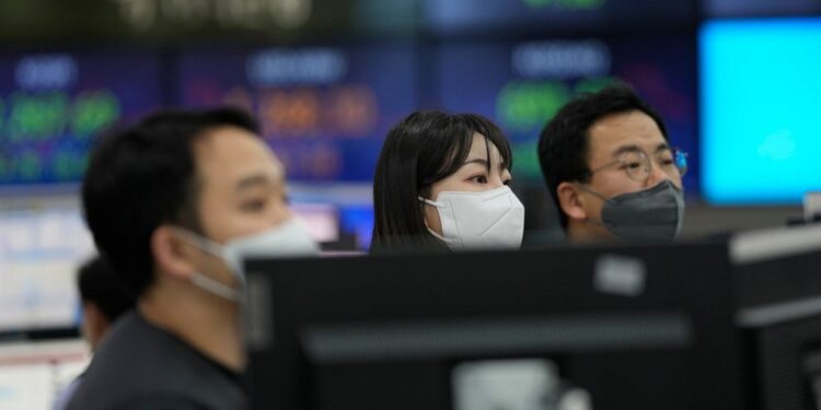 Asian shares extend losses after Wall Street decline