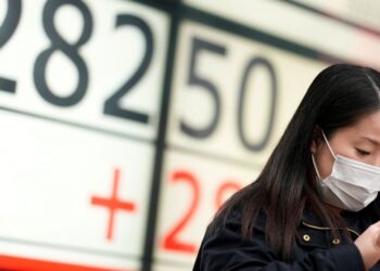 Wall Street ends mixed in an uneven start for December