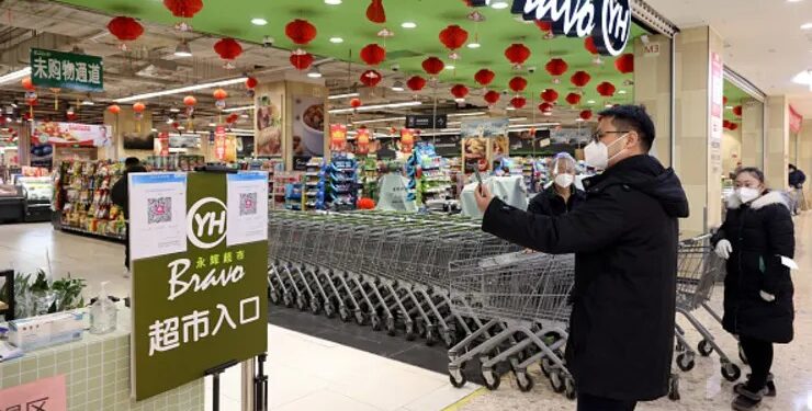 China eases Covid restrictions on travel and production