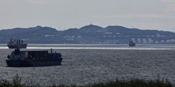 Oil climbs on supply disruptions, China optimism