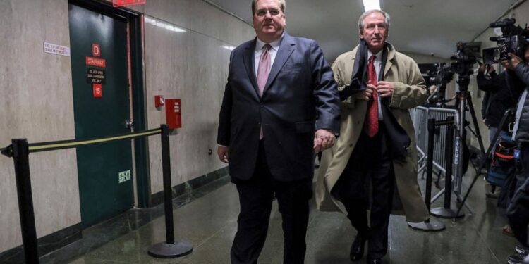 Defense attorneys Michael van der Veen, right, and William Brennan, left