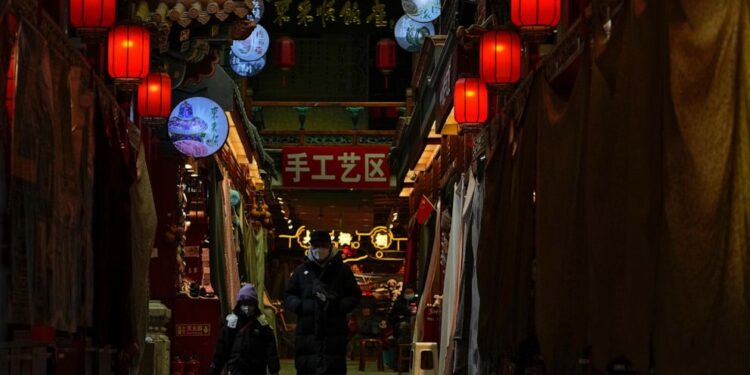 China reports economic growth fell to 3% last year under pressure from virus controls, real estate slump