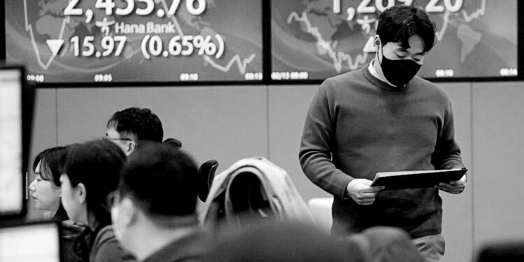 Asian stocks slide ahead of US inflation update