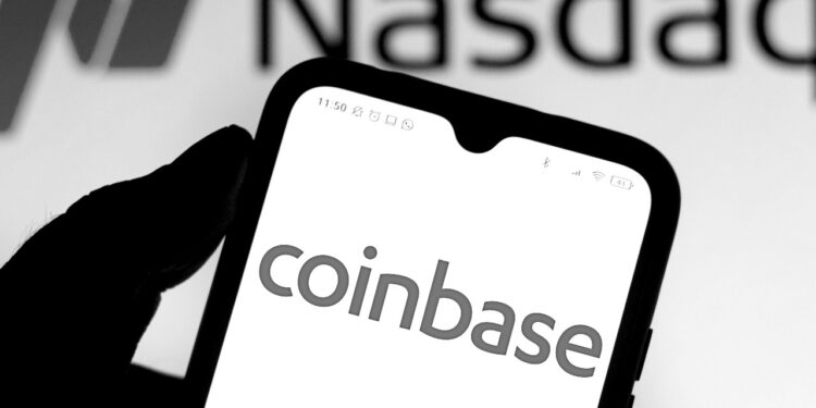 Coinbase Q4 revenue and earnings beat expectations, but transaction volume falls 12% from Q3