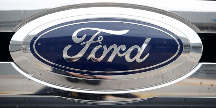Ford 4Q profit drops 90%, company says more cost cuts coming