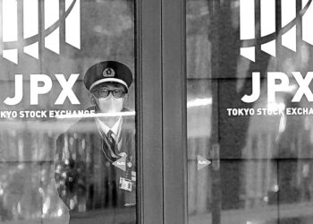 Asian shares skid after inflation report thumps Wall Street