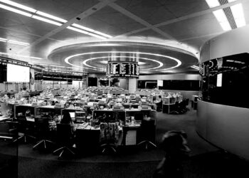 Stocks gain, dollar slides, as banking fear eases