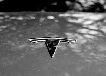 Tesla says it will cut costs of next-generation cars in half