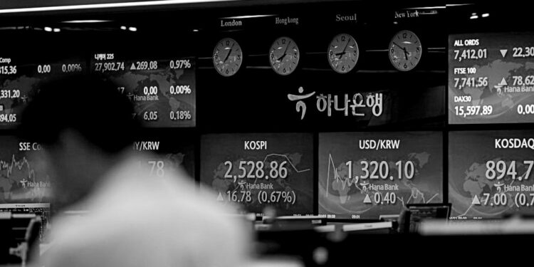 Asian shares mostly higher after mixed day on Wall Street