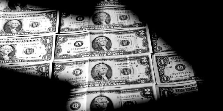 Dollar drops as inflation cools more than expected