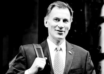 UK government borrowed £13bn less than expected last year