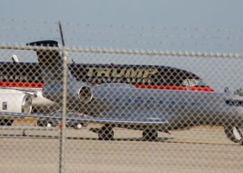 Trump plane takes off in Florida, heads for court surrender