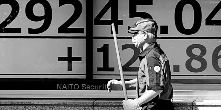 Asia shares mixed on holiday mode trade