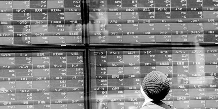 Asian shares mostly lower on looming worry over US banks