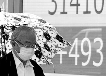 Asian markets mostly higher after Biden-McCarthy deal on US debt