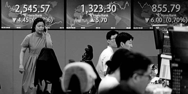 Asian shares are mixed after China reports weaker manufacturing in June