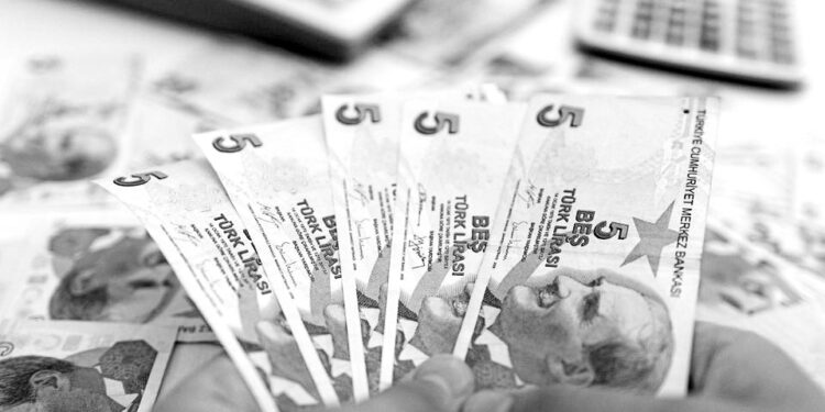 Turkey’s lira hits fresh record lows after rate hike