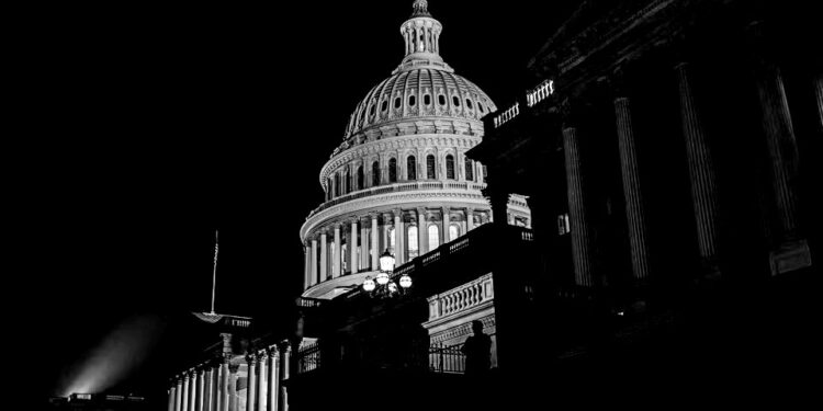 US Congress averts historic default, approves debt-limit suspension