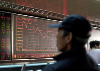 Asia shares slip as China data underwhelms