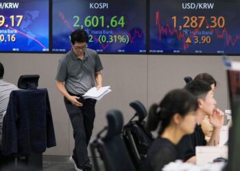 Asian shares mostly higher after winning week on Wall Street