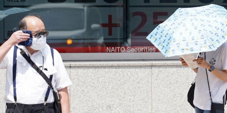 Asian shares extend losses after China reports lower growth than expected