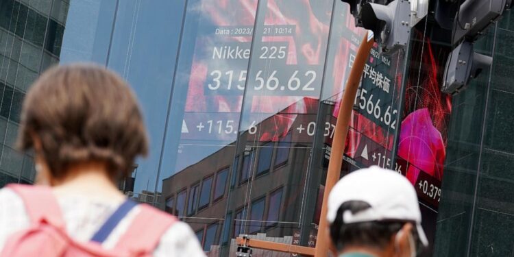 Asian stocks mixed as traders await Fed conference for interest rate update