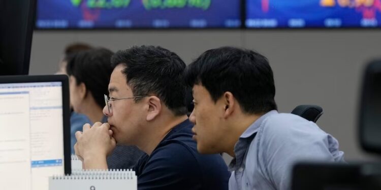 Asian shares mixed after interest rates-driven sell-off on Wall Street