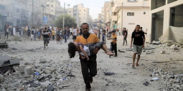 Palestinians flee northern Gaza as Israel masses troops for assault