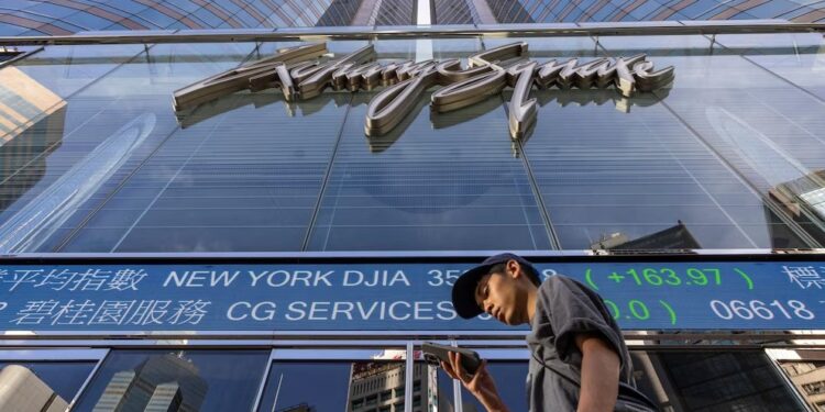 China Evergrande soars after property developer’s stocks resume trading