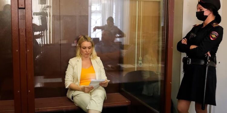 Former Russian TV journalist gets 8 1/2-year sentence in absentia for war criticism