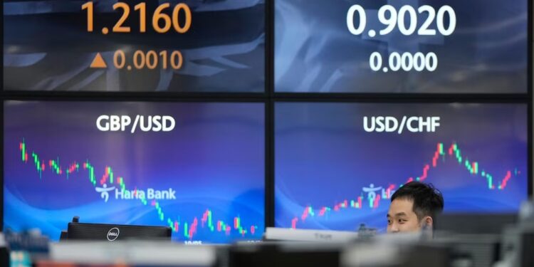 Asian shares trade mixed as investors look ahead to economic data