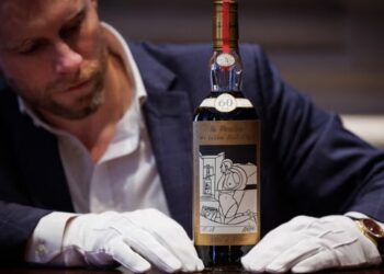 Cheers! Bottle of Scotch whisky sells for a record $2.7 million at auction