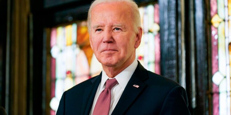 Biden, at site of white supremacist murders, warns of Trump-led extremism