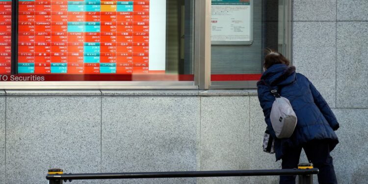 Asian shares trade mixed after Wall Street dips amid dimming rate cut hopes