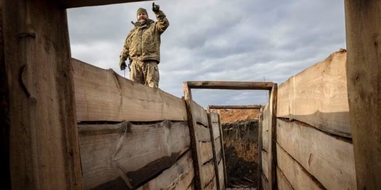 Ukraine builds barricades, digs trenches as focus shifts to defence