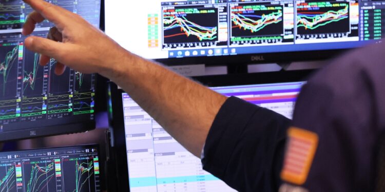 On this day in 1997: The Dow Jones Industrial Average first eclipsed the 7,000 mark, then closed at 7,022.44.