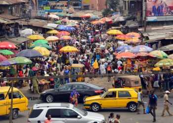 Nigeria’s currency has fallen to a record low as inflation surges. How did things get so bad?