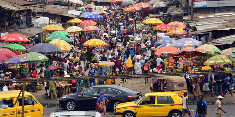 Nigeria’s currency has fallen to a record low as inflation surges. How did things get so bad?