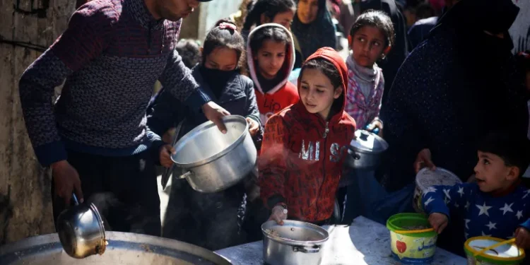 Palestinians in Gaza begin Ramadan with hunger worsening and no end in sight to the Israel-Hamas war