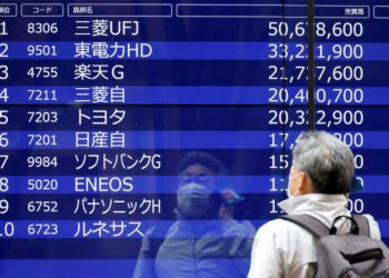 Asian shares slide on US rate cut rethink, Middle East worries